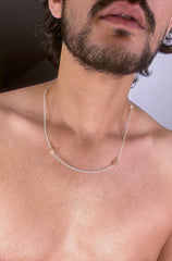 A peach moonstone bead necklace strung in silver. 