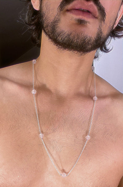 A rose quartz bead necklace strung in silver. 