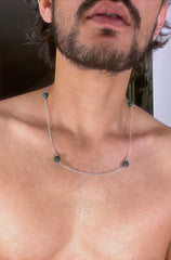 A malachite bead necklace strung in silver. 